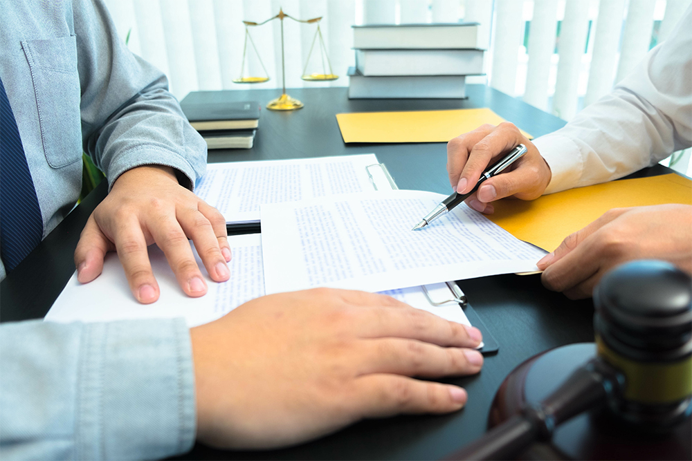 People working on a document together