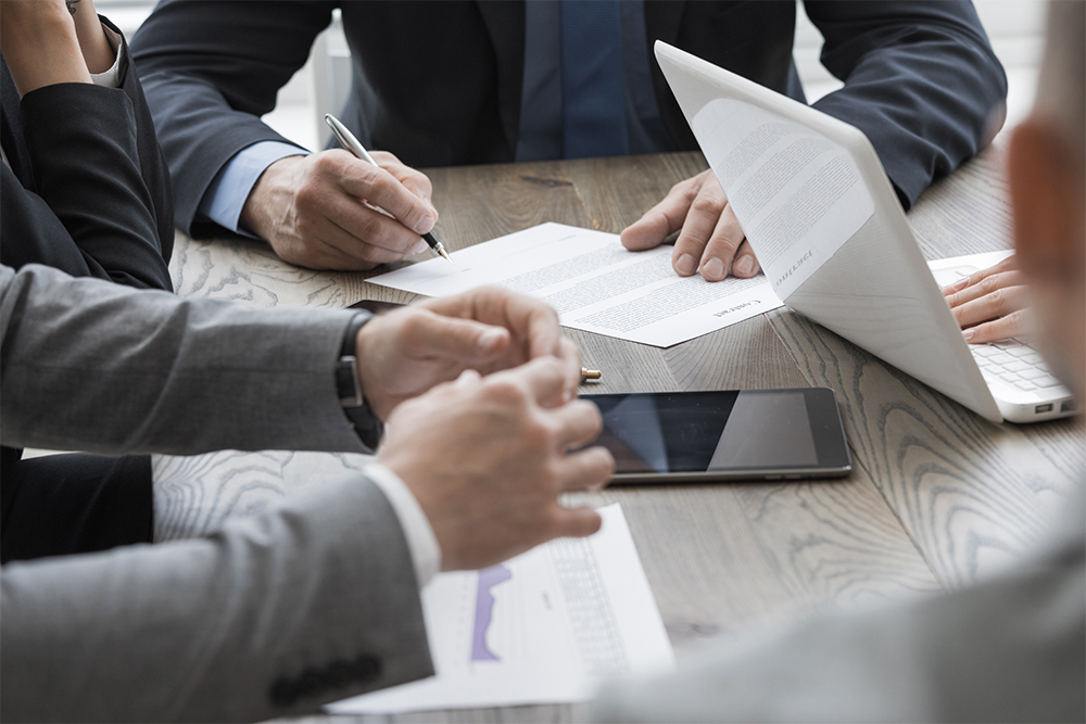 A group of people in a meeting